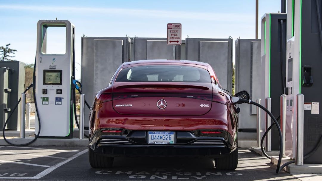 Red Mercedes-AMG EQS fast charging