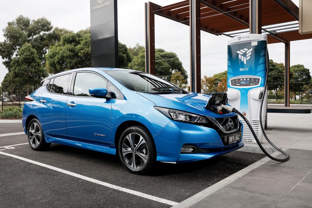 Blue Nissan Leaf electric hatch charging at Tritium RT50