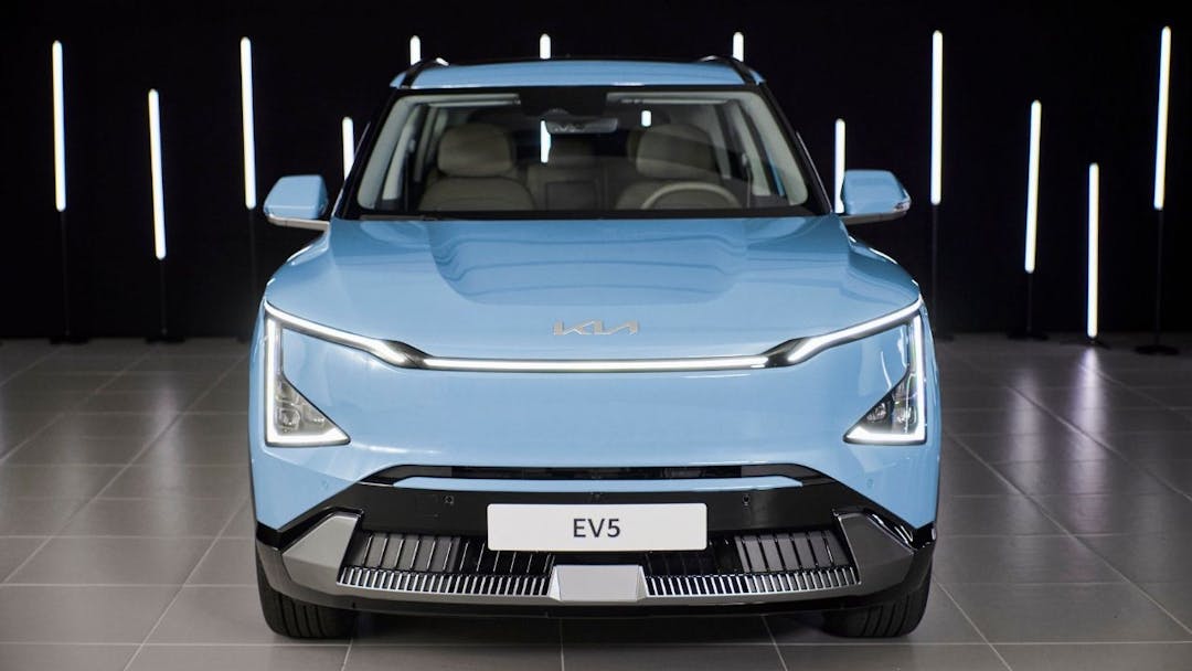 Kia EV5 in sky blue front view parked