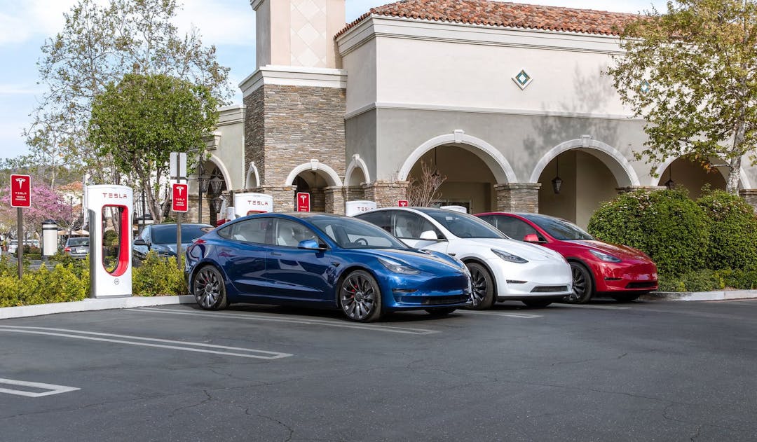 Tesla Model 3 and Model Ys charging at Tesla Supercharger