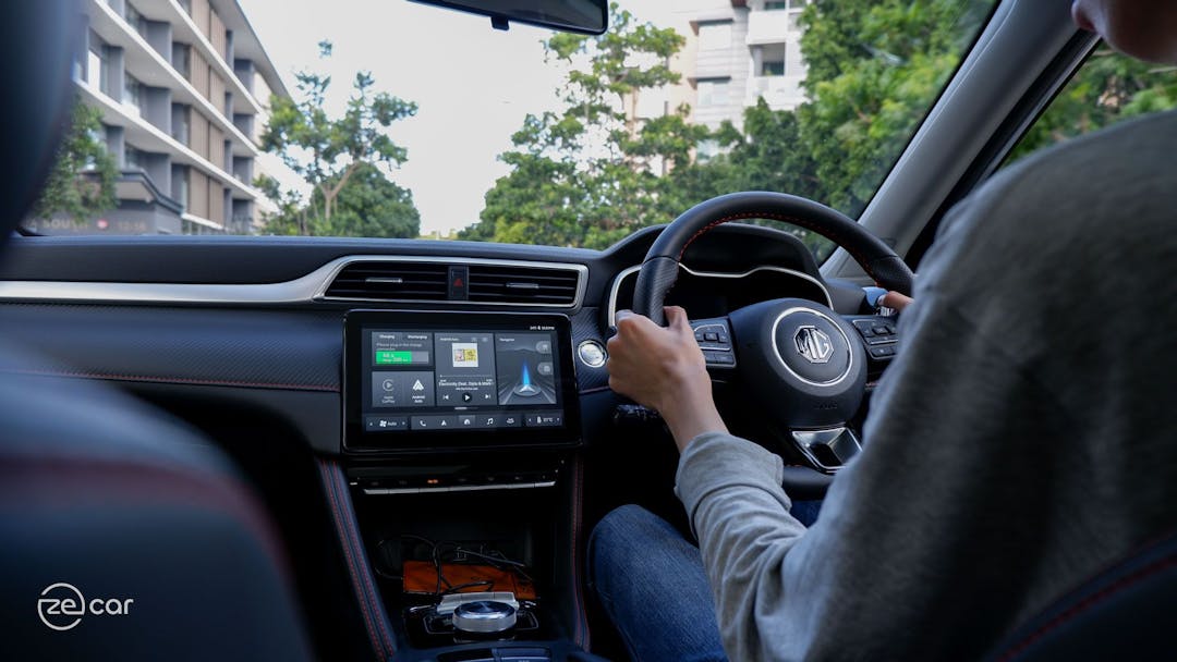 Man driving MG ZS EV interior view