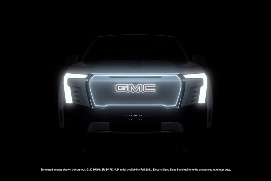 GMC Sierra Denali EV teaser image of lights and front grille