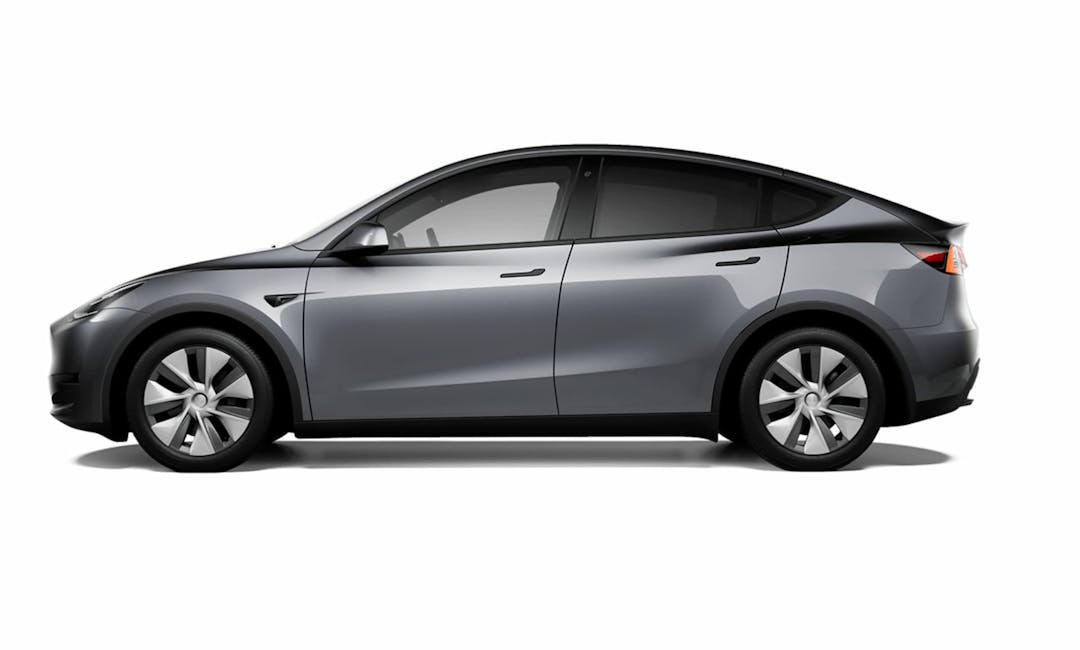 Tesla Model Y driving and side profile