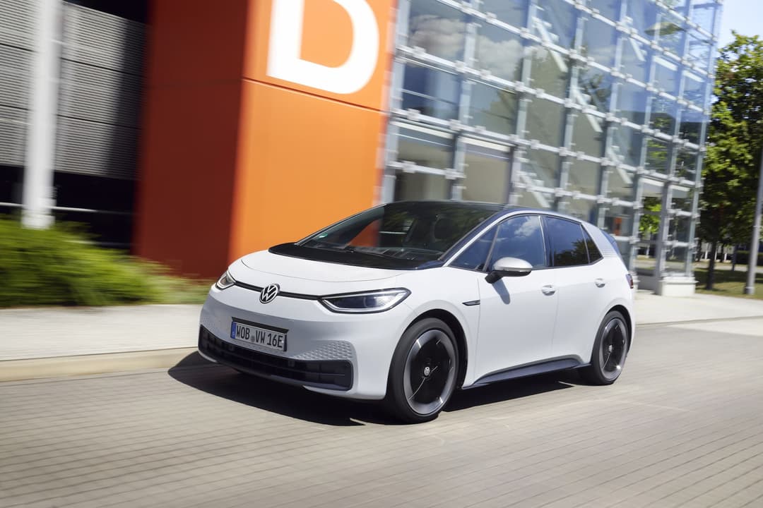 White Volkswagen ID.3 EV driving in Germany White Volkswagen ID.3 EV driving in Germany