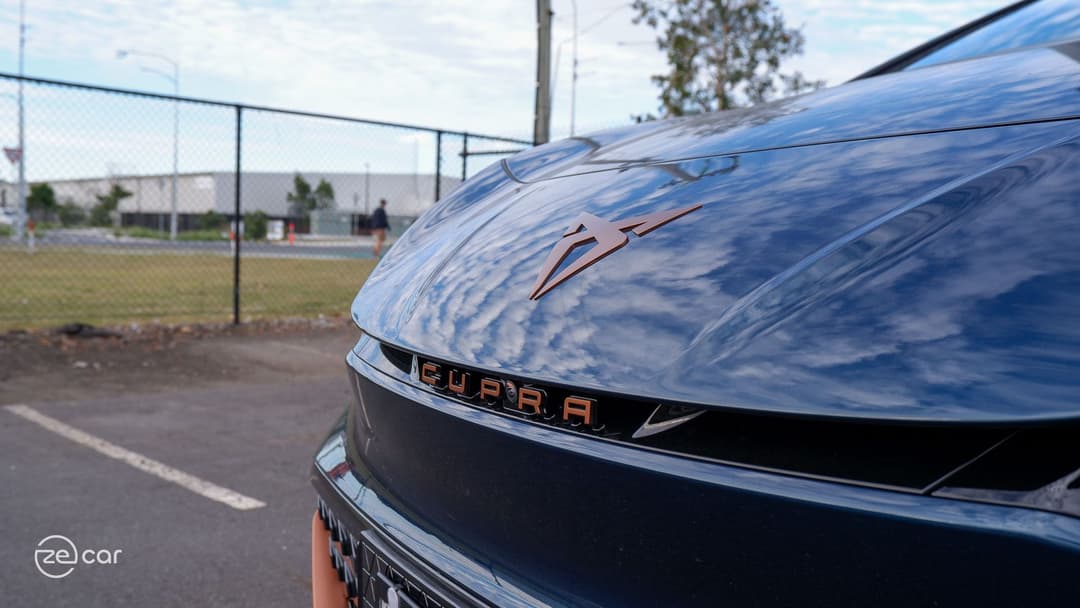 Cupra Born C-pillar and front Cupra logo