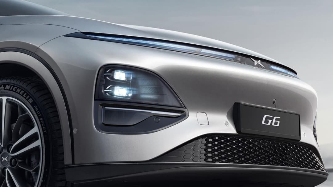 Xpeng G6 in grey zoomed in on headlights Xpeng G6 in grey zoomed in on headlights
