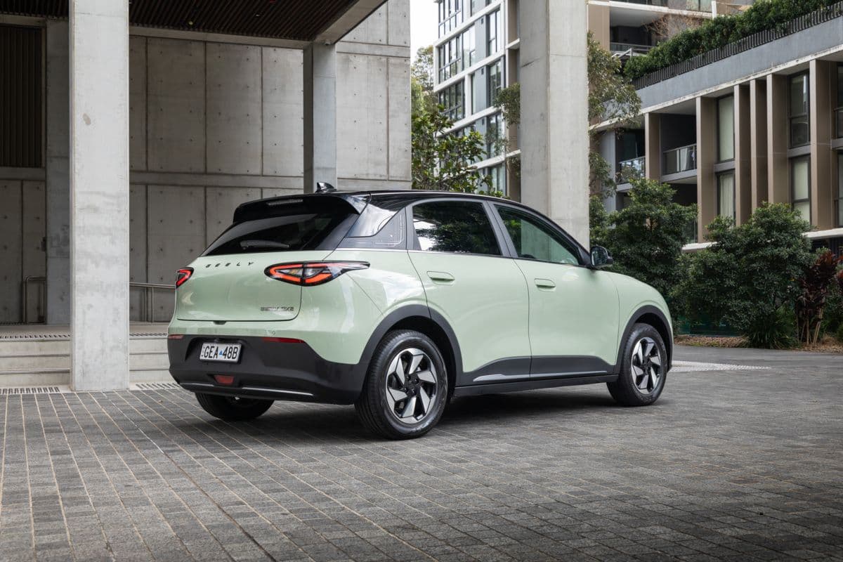Geely EX2 rear three-quarter view showcasing LED taillights and compact dimensions Geely EX2 rear three-quarter view showcasing LED taillights and compact dimensions