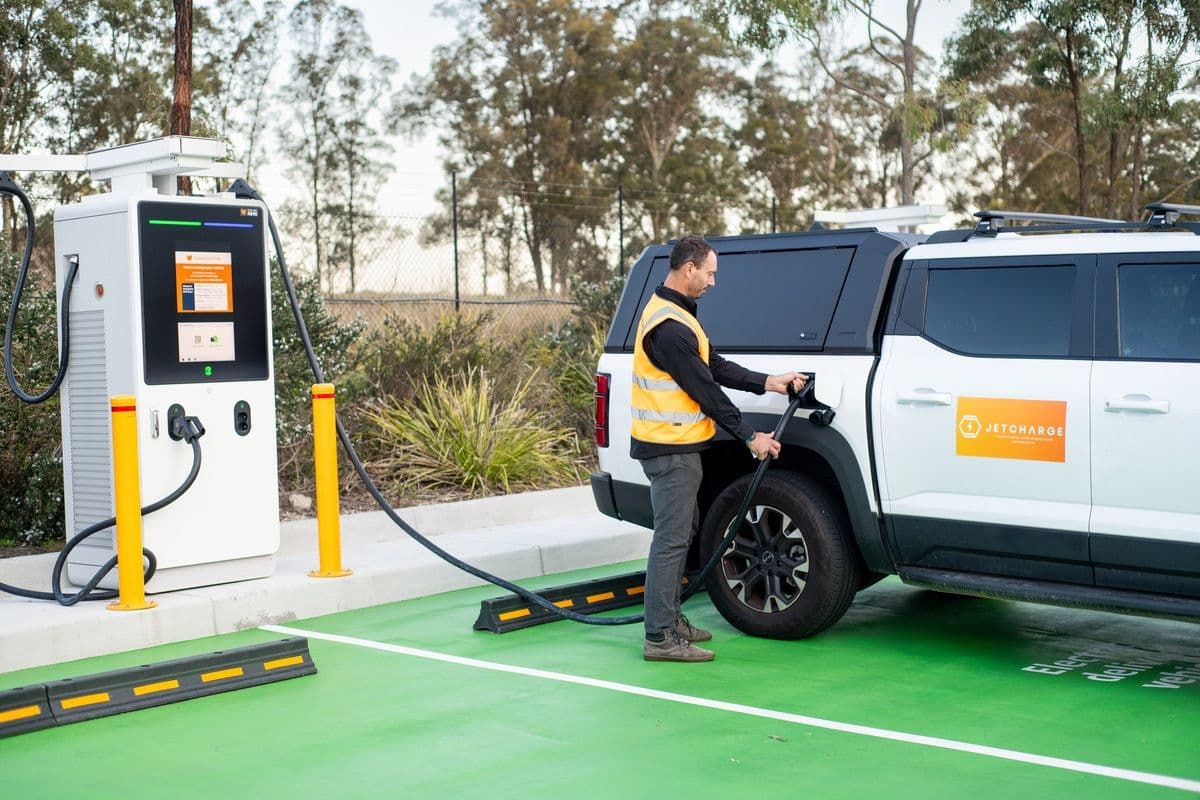 EV being charged at charging station EV being charged at charging station