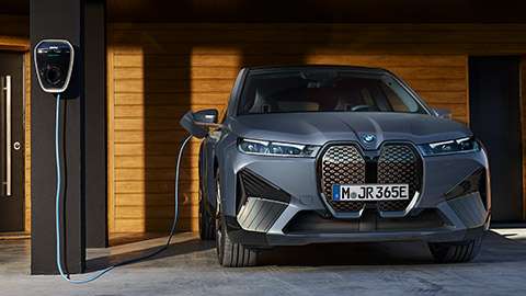 BMW iX Wallbox Plus charging at home station BMW iX Wallbox Plus charging at home station