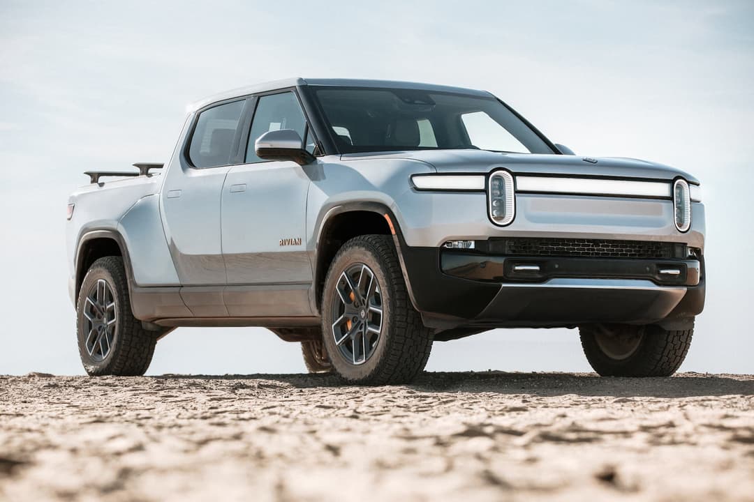 Silver Rivian R1T pickup ute offroad Silver Rivian R1T pickup ute offroad