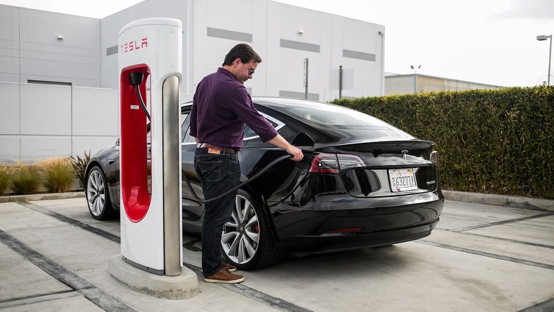 Tesla Model 3 at supercharger Tesla Model 3 at supercharger