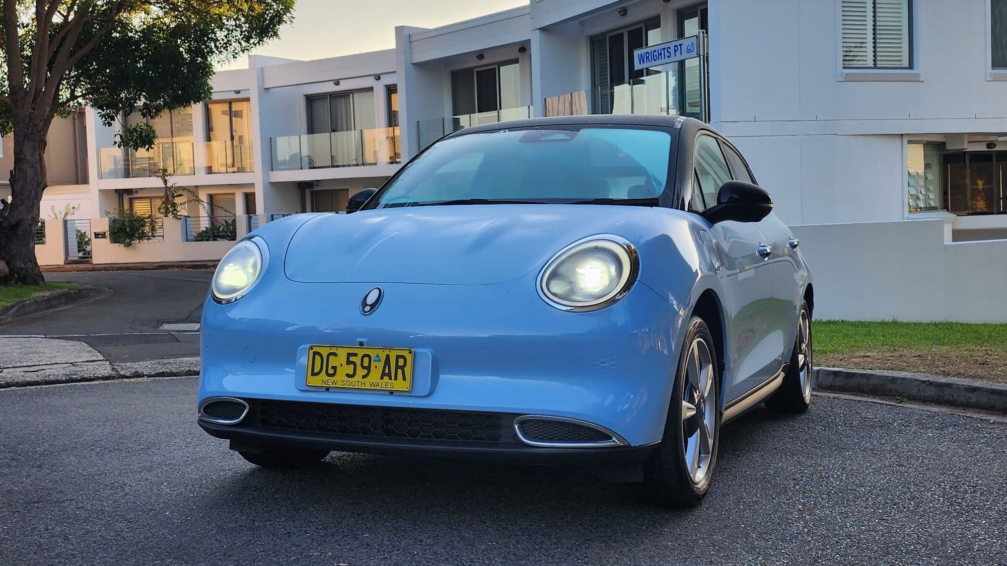 GWM Ora exterior front three-quarter view showing retro-inspired design and 18-inch alloy wheels GWM Ora exterior front three-quarter view showing retro-inspired design and 18-inch alloy wheels