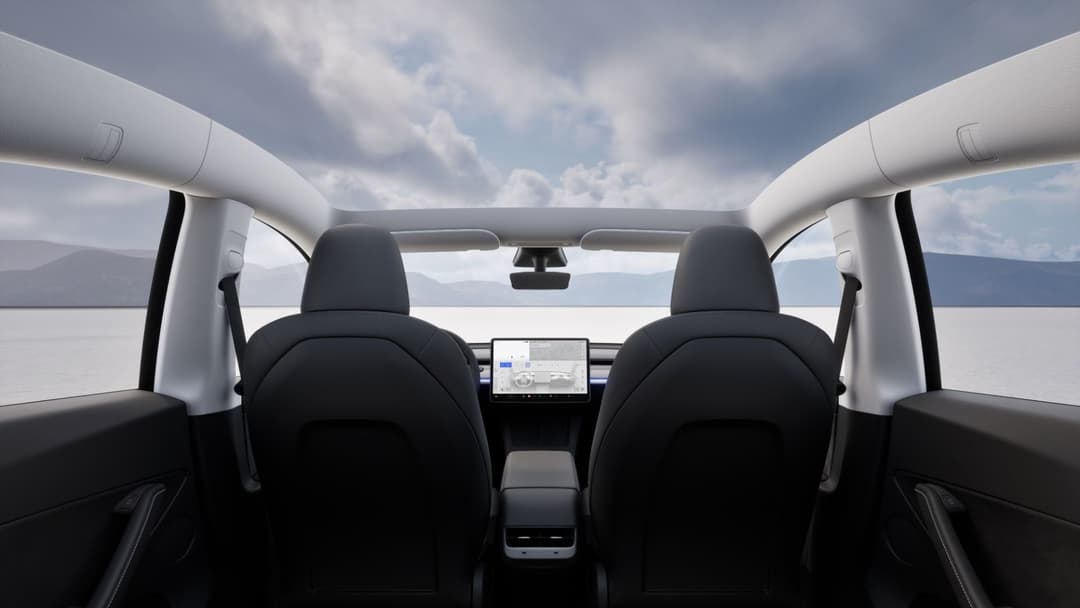 Tesla Model Y interior and glass roof view Tesla Model Y interior and glass roof view
