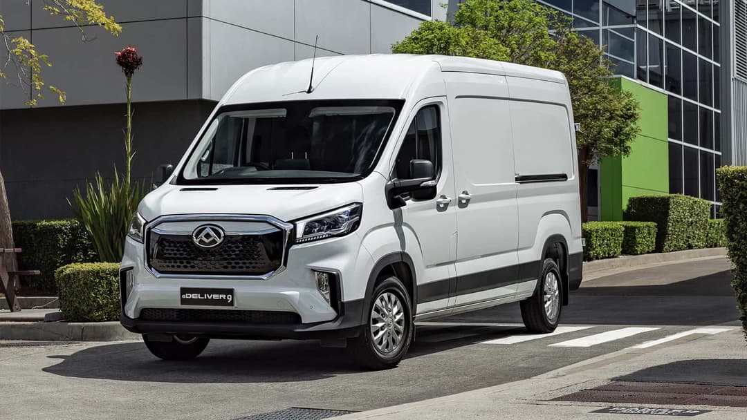 White LDV e-Deliver 9 angled front view parked in pedestrian lane White LDV e-Deliver 9 angled front view parked in pedestrian lane