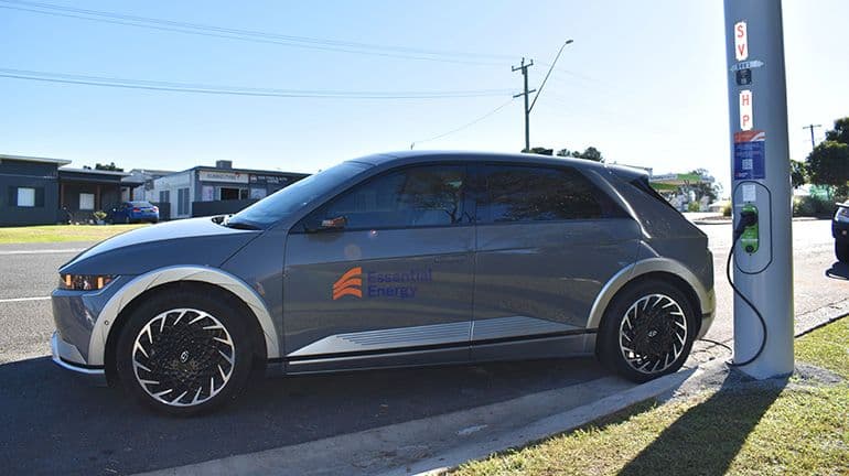 Composite streetlight column with integrated 7kW EV charger Composite streetlight column with integrated 7kW EV charger