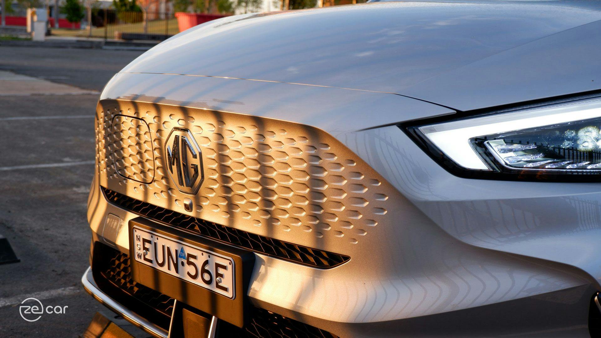 MG ZS EV front grille in golden hour sunset