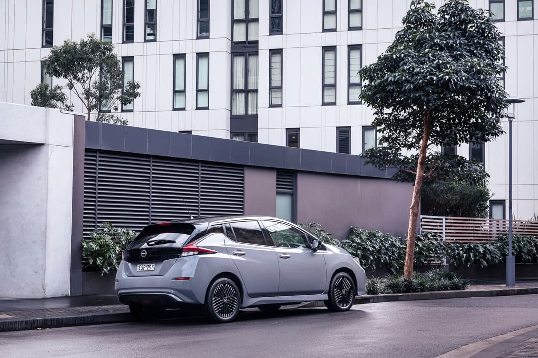 2023 Nissan Leaf parked in urban street 2023 Nissan Leaf parked in urban street