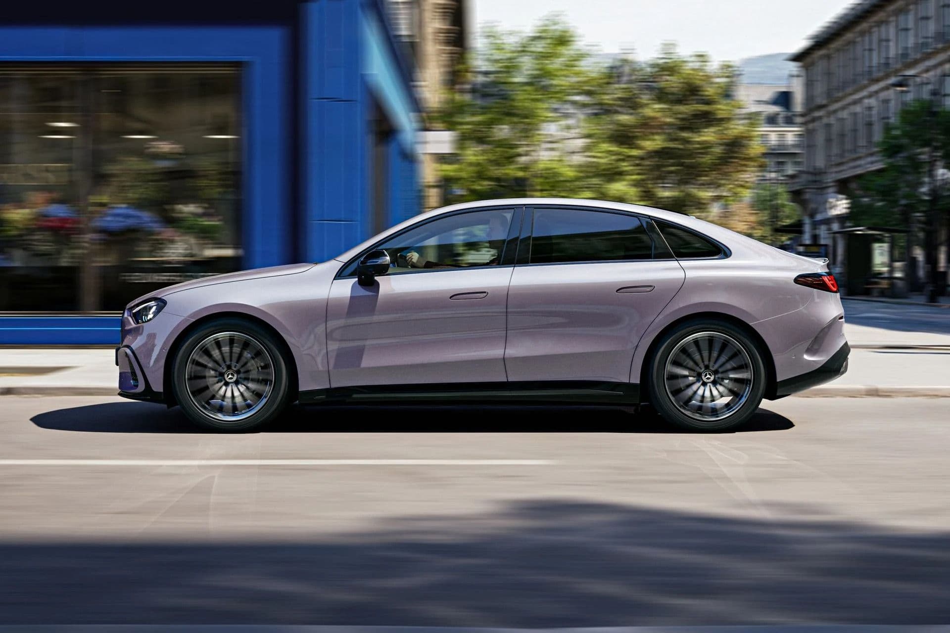 Side view of the Mercedes-Benz C-Class electric showing its coupé-like roofline Side view of the Mercedes-Benz C-Class electric showing its coupé-like roofline