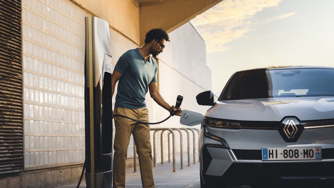 2024 Renault Megane E-Tech in grey public charging front view 2024 Renault Megane E-Tech in grey public charging front view