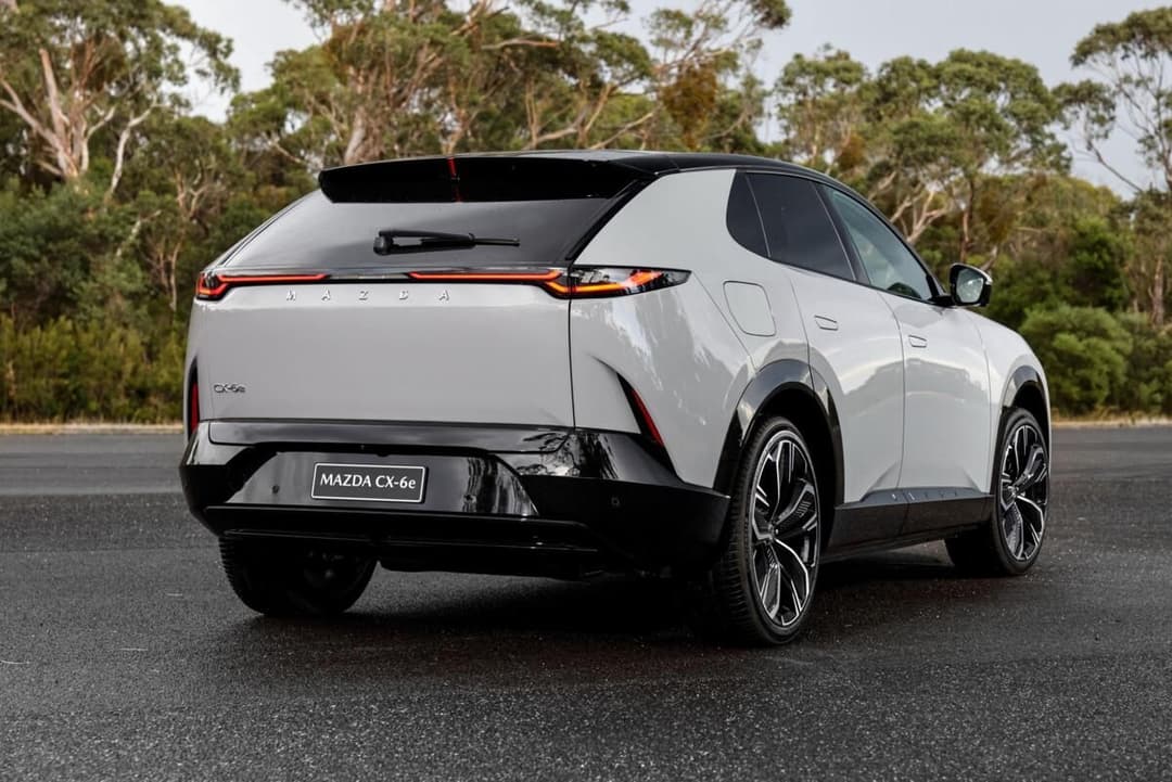 Mazda CX-6e rear three-quarter view Mazda CX-6e rear three-quarter view