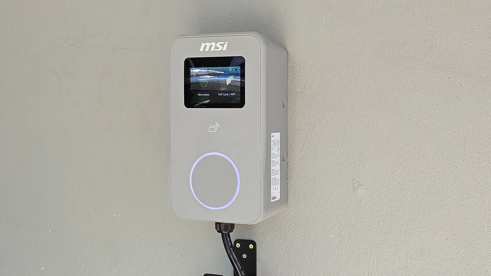 MSI Eco Premium EV charger with 5-inch screen mounted on a wall MSI Eco Premium EV charger with 5-inch screen mounted on a wall