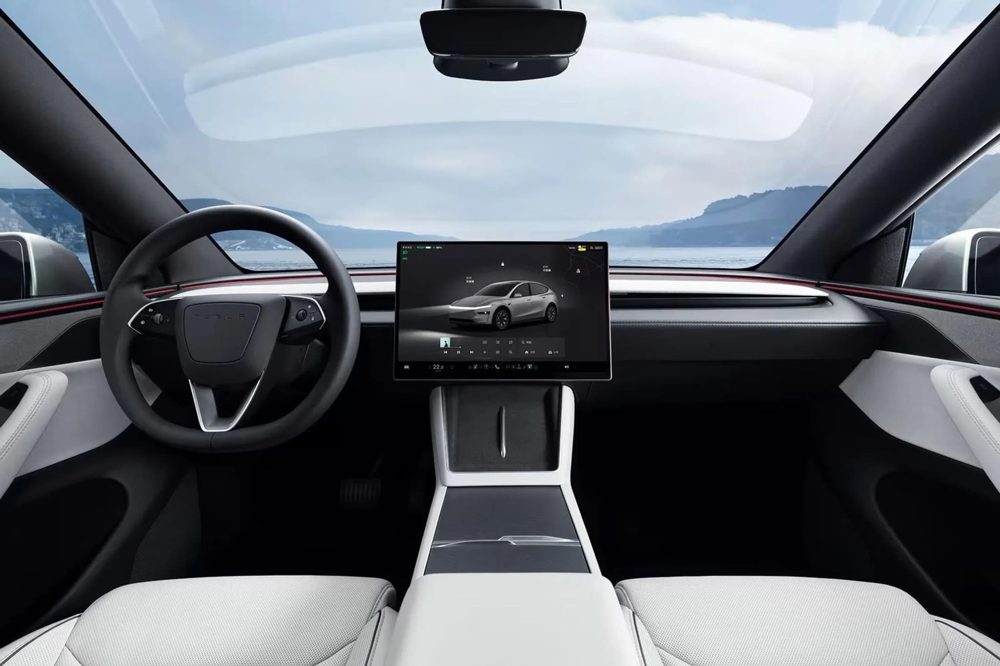 Tesla Model Y L interior with second-row captain's chairs Tesla Model Y L interior with second-row captain's chairs
