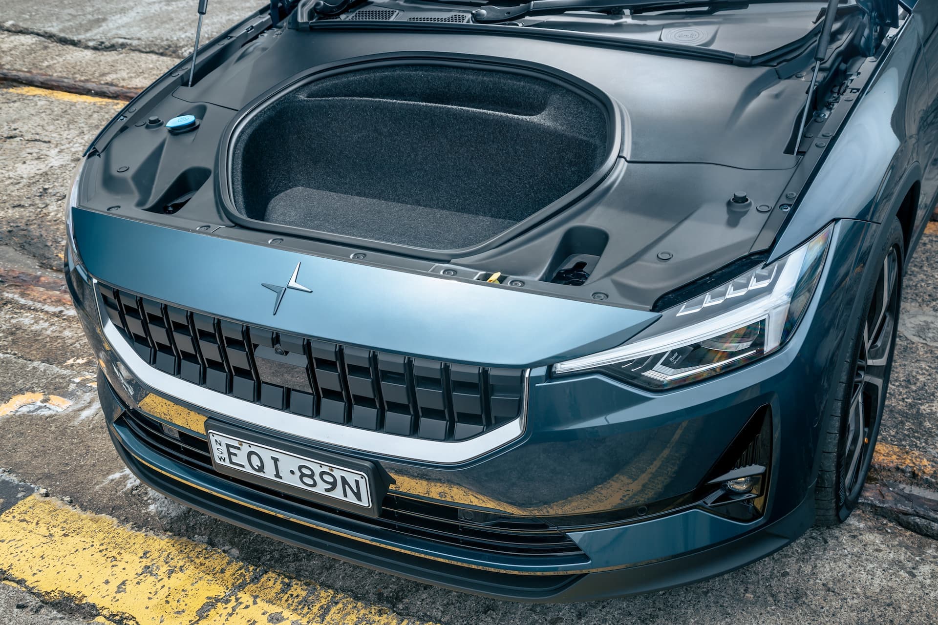 Blue Polestar 2 electric car open frunk Blue Polestar 2 electric car open frunk