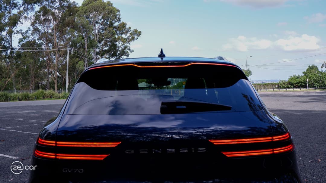 Genesis Electrified GV70 mountain-type white door panel and rear brake lights
