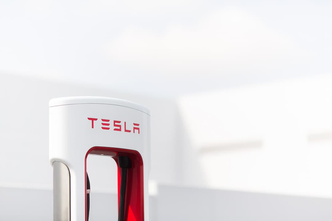 Tesla Supercharging stall with red Tesla logo Tesla Supercharging stall with red Tesla logo