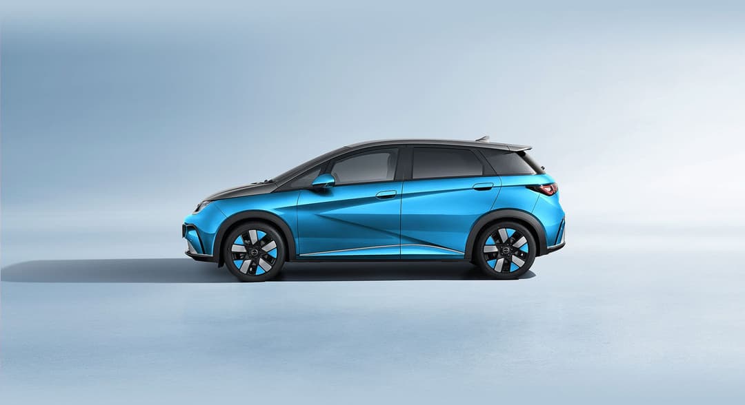 Blue-grey BYD Dolphin exterior side view Blue-grey BYD Dolphin exterior side view