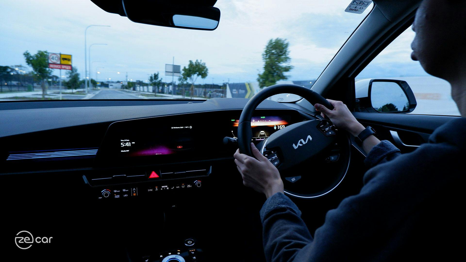Man driving Kia Niro EV interior view