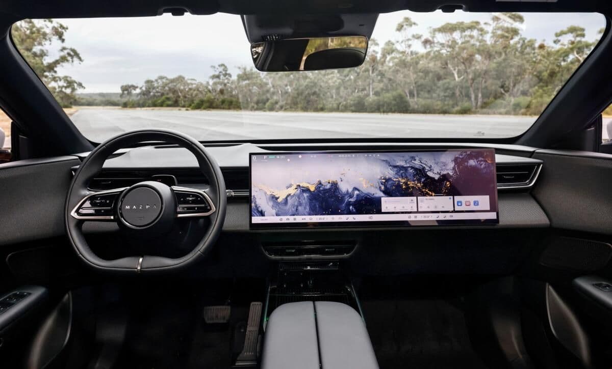 Mazda CX-6e interior and side profile Mazda CX-6e interior and side profile