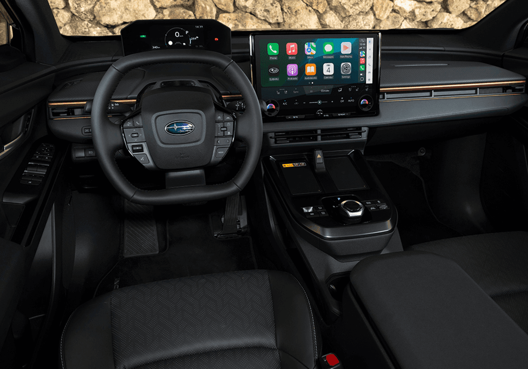 2026 Subaru Uncharted interior showing 14-inch touchscreen and square steering wheel 2026 Subaru Uncharted interior showing 14-inch touchscreen and square steering wheel