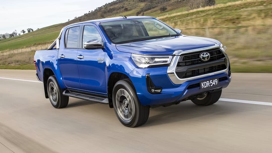 Blue Toyota Hilux on the road Blue Toyota Hilux on the road