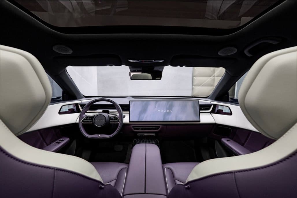 Mazda CX-6e interior showing 26-inch dashboard display Mazda CX-6e interior showing 26-inch dashboard display