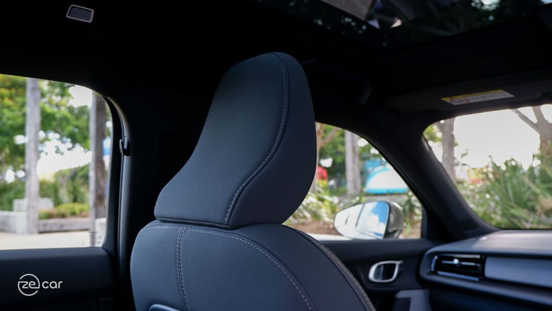 Polestar 2 frameless wing mirror and seat headrest