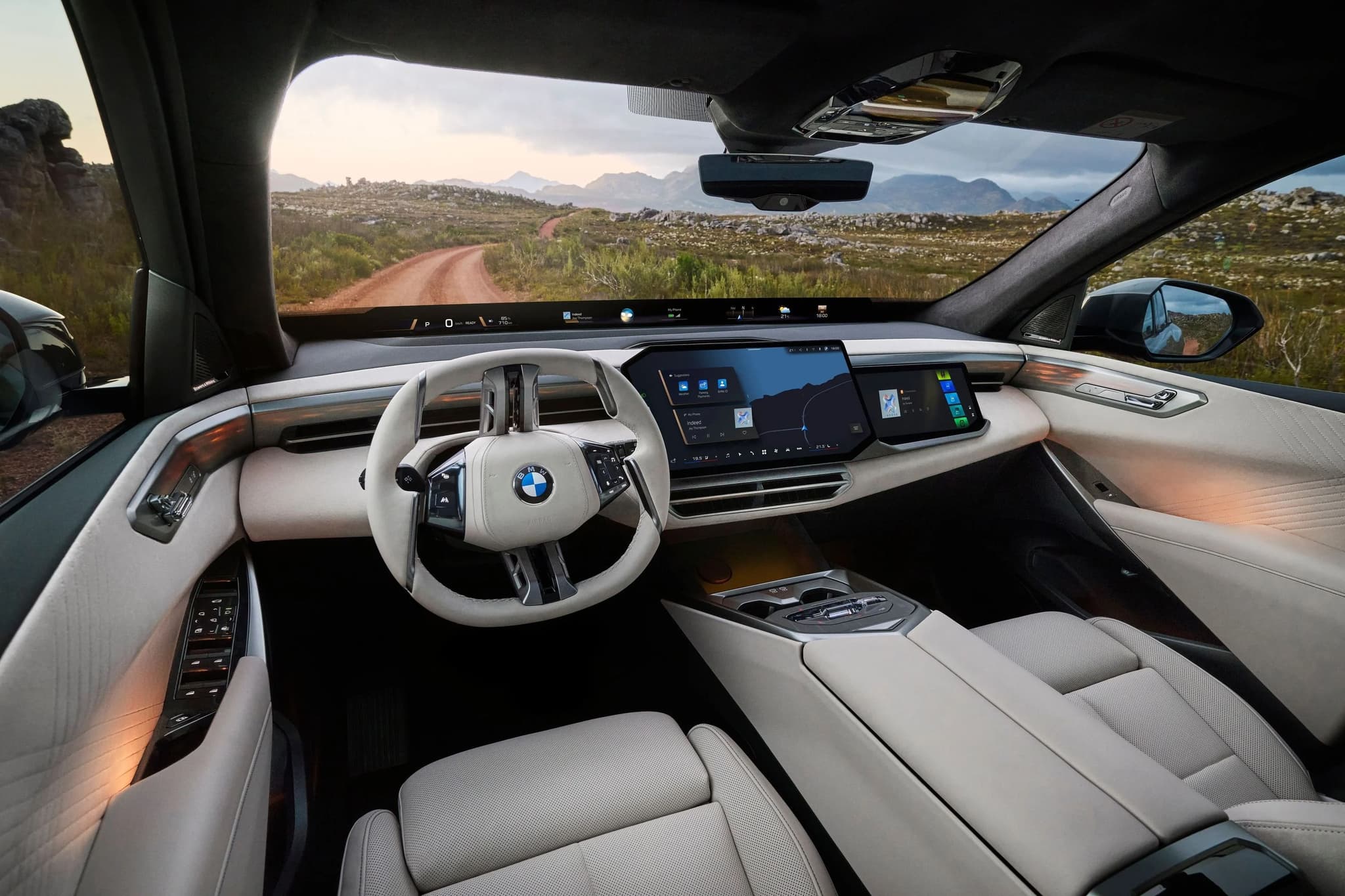 BMW X5 cabin showing 17.9-inch central display and passenger screen BMW X5 cabin showing 17.9-inch central display and passenger screen