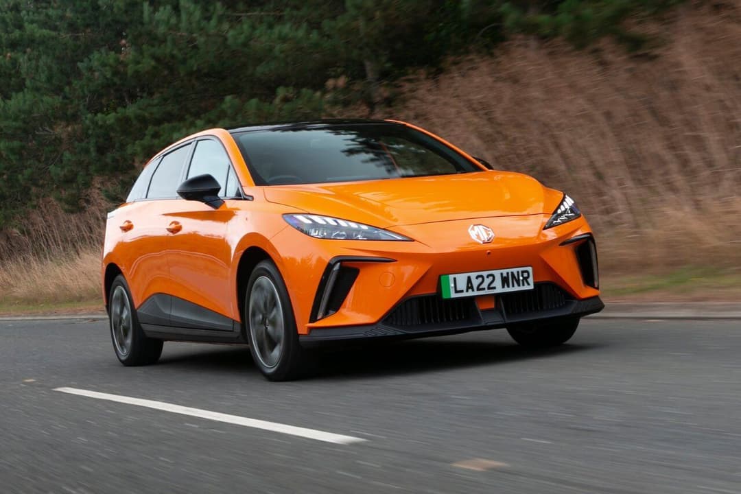 Orange MG4 EV on the road Orange MG4 EV on the road