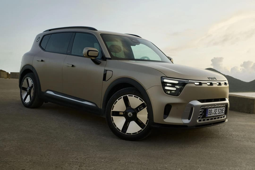 Close-up front three-quarter view of the Smart #5 showing LED headlights, grille design, and sleek front fascia Close-up front three-quarter view of the Smart #5 showing LED headlights, grille design, and sleek front fascia