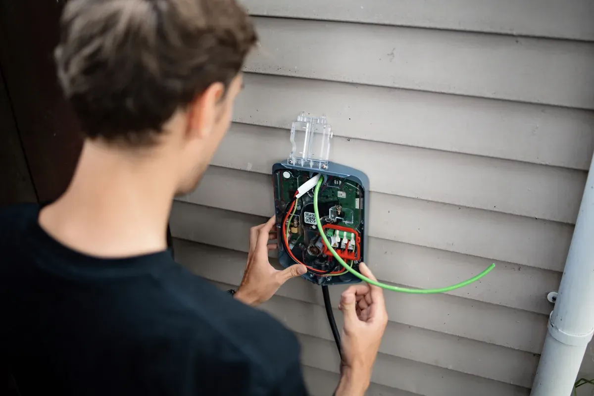 Home EV wall charger installed by an electrician Home EV wall charger installed by an electrician