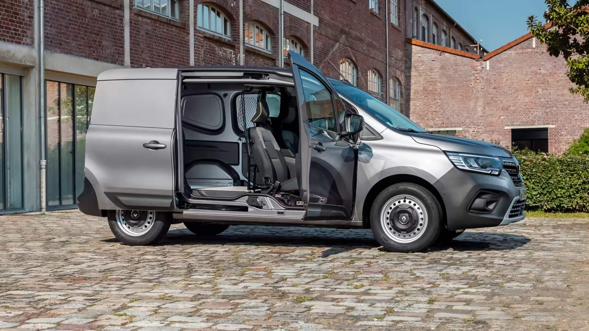 2024 Renault Kangoo E-Tech in grey parked with open doors 2024 Renault Kangoo E-Tech in grey parked with open doors