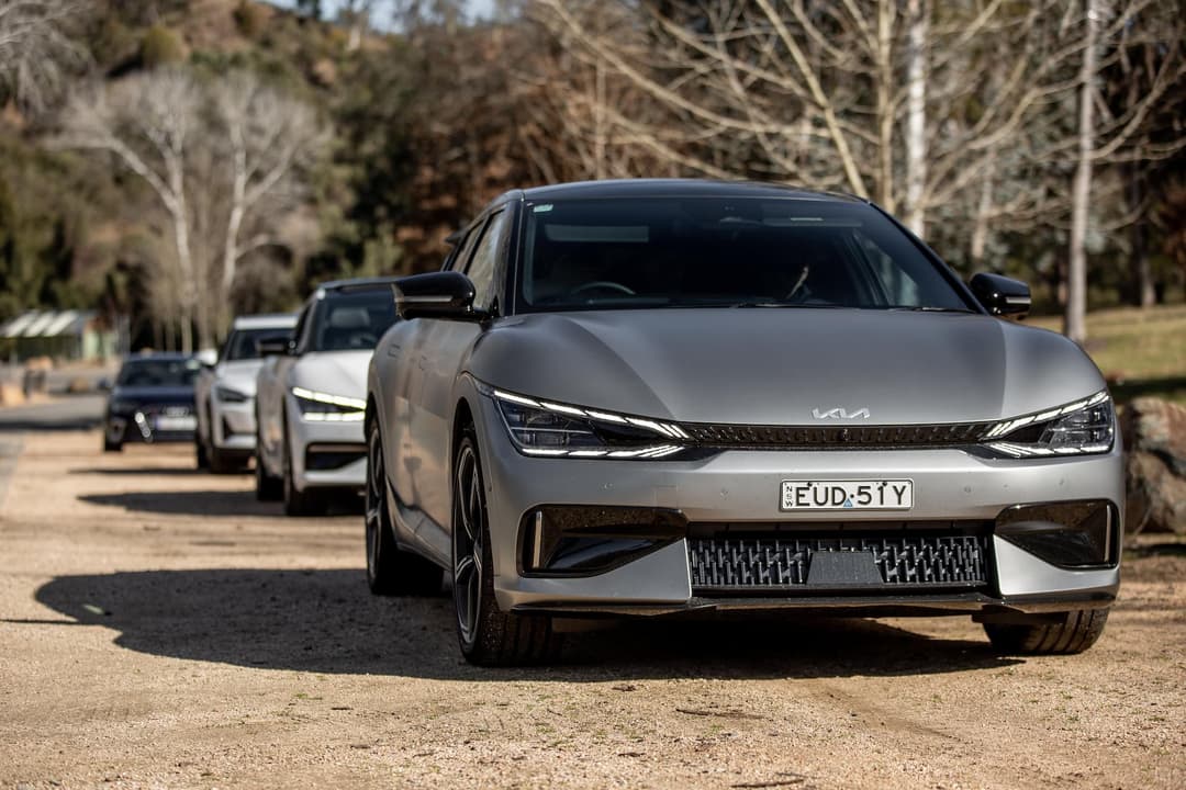 Kia EV6 GT in front of EV6 GT-Line and Polestar 2 in rural Australia Kia EV6 GT in front of EV6 GT-Line and Polestar 2 in rural Australia