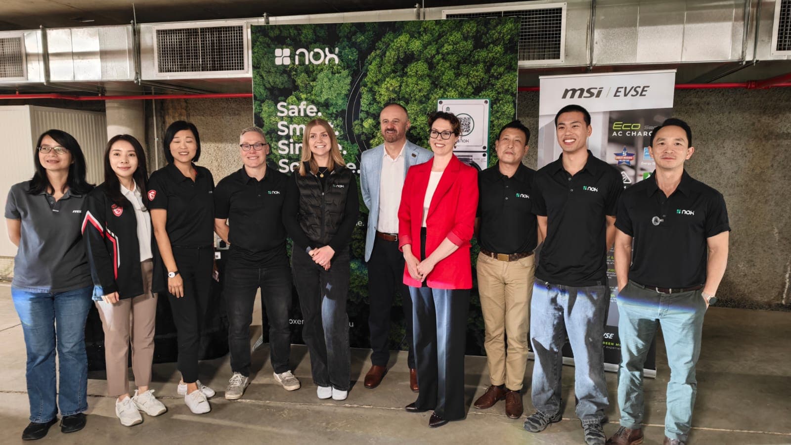 A minister with the NOX Energy and MSI team at the launch of EV charging at The Griffin in Canberra A minister with the NOX Energy and MSI team at the launch of EV charging at The Griffin in Canberra