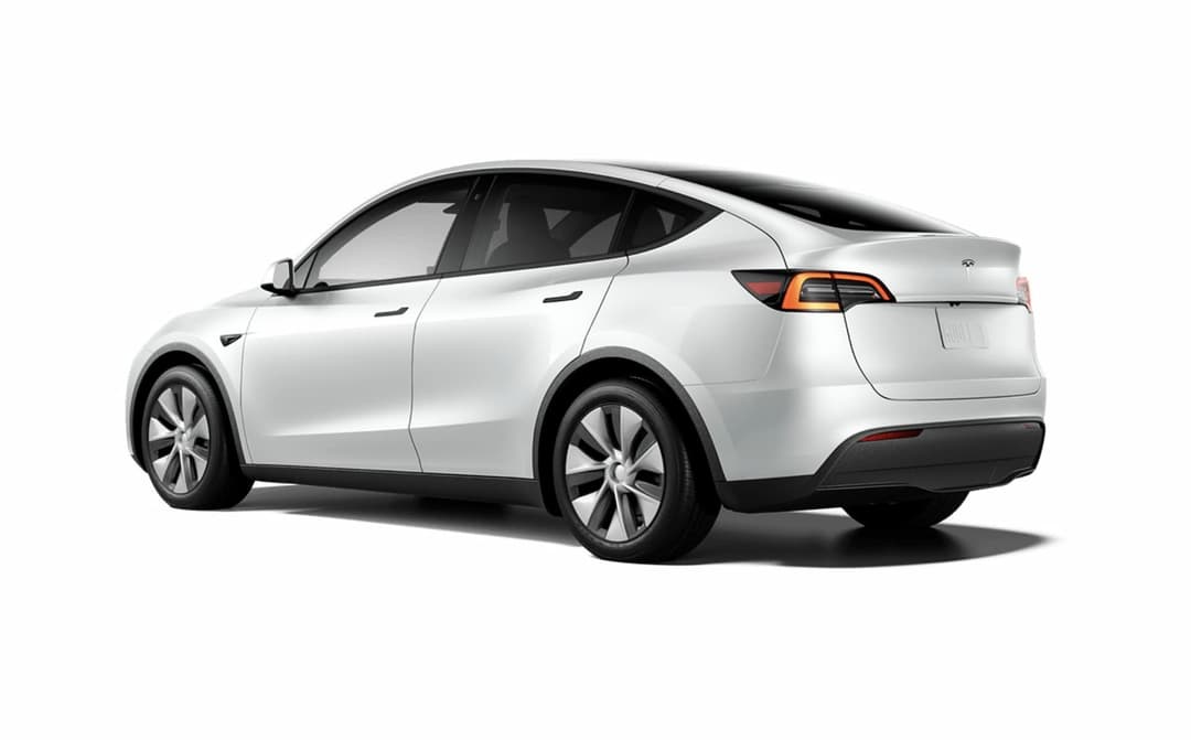 White Tesla Model Y base rear-wheel drive rear-end view White Tesla Model Y base rear-wheel drive rear-end view