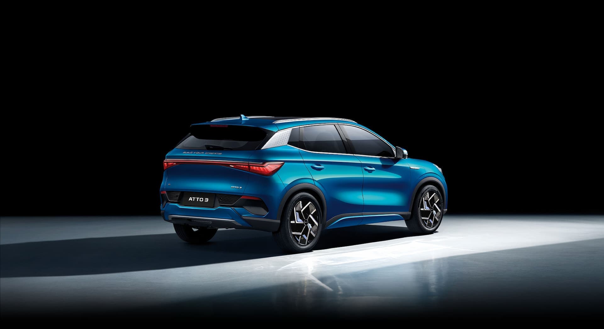 Blue BYD Atto 3 rear side view Blue BYD Atto 3 rear side view