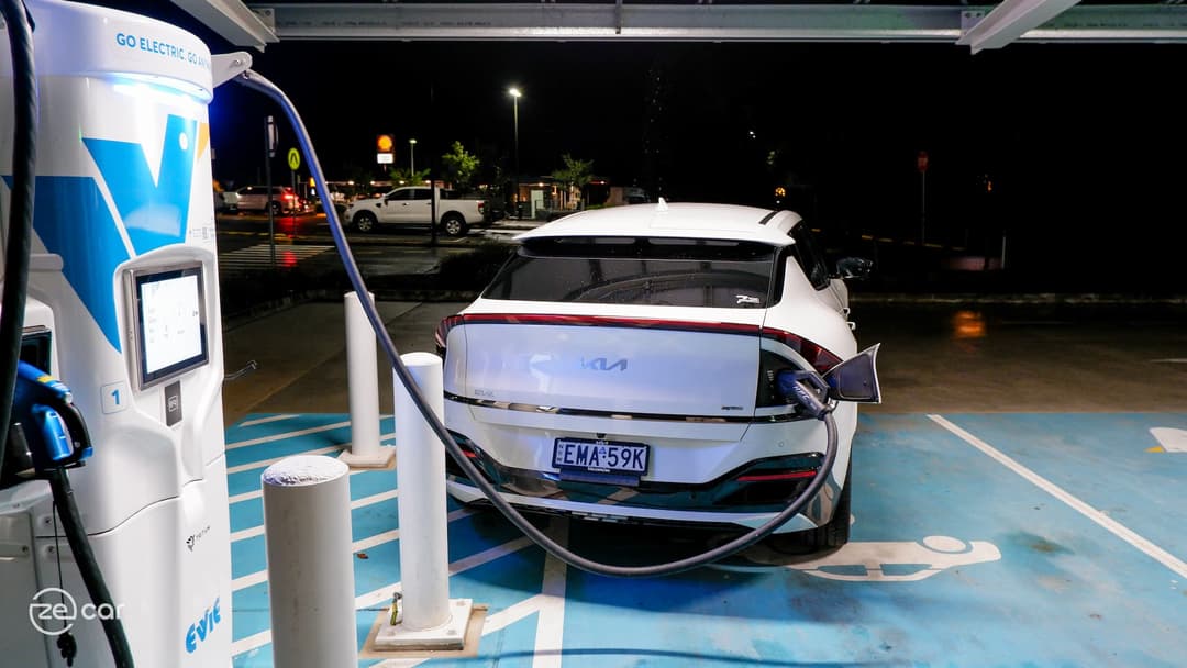 Kia EV6 parked on an angle charging at Evie Networks ultra rapid charger Kia EV6 parked on an angle charging at Evie Networks ultra rapid charger