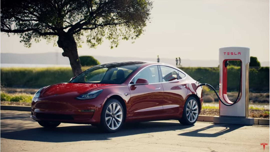 Tesla Model 3 on supercharger Tesla Model 3 on supercharger