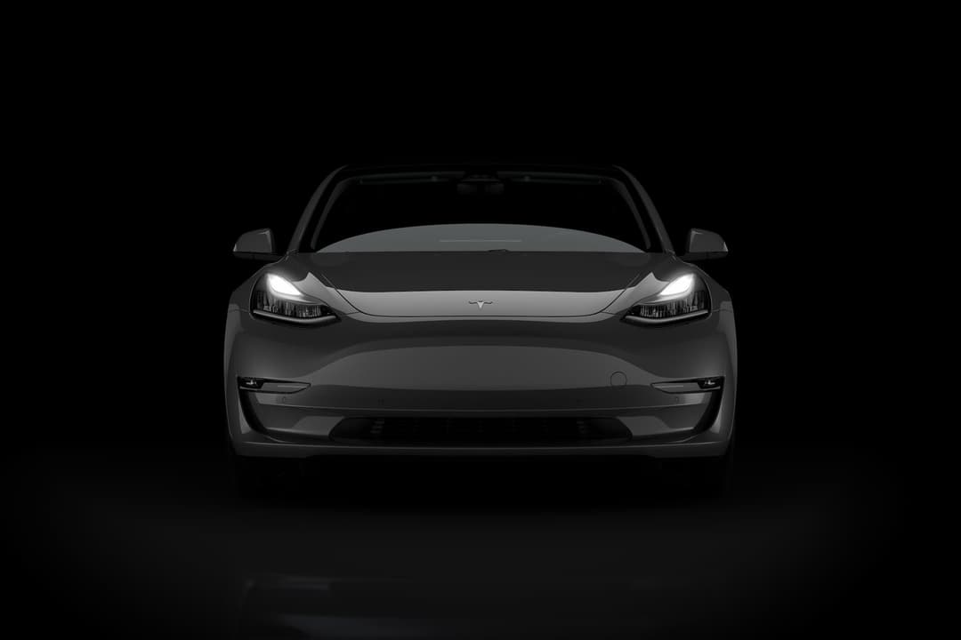 Tesla Supercharger stall and Model 3 front