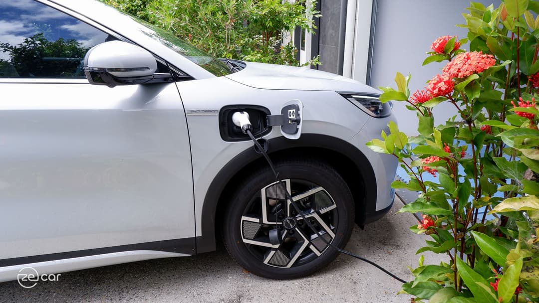 BYD Atto 3 charging and owner portrait
