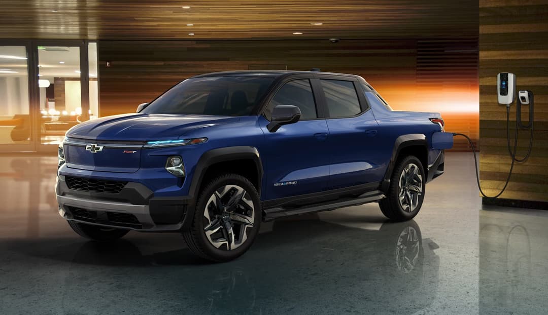 Chevrolet Silverado EV ute plugged into charging wallbox Chevrolet Silverado EV ute plugged into charging wallbox